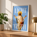 Light & Truth blue Jesus poster in a styled tabletop mockup beside a plant and a brass-colored lamp.