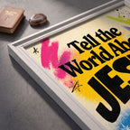 Angled close-up of the Tell the World About Jesus poster showing black lettering and colorful paint-effect details.