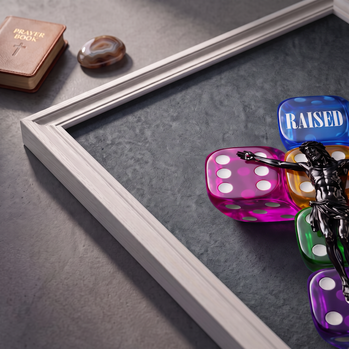 Angled close-up of the RAISED grey poster showing Jesus over colorful dice and RAISED lettering.