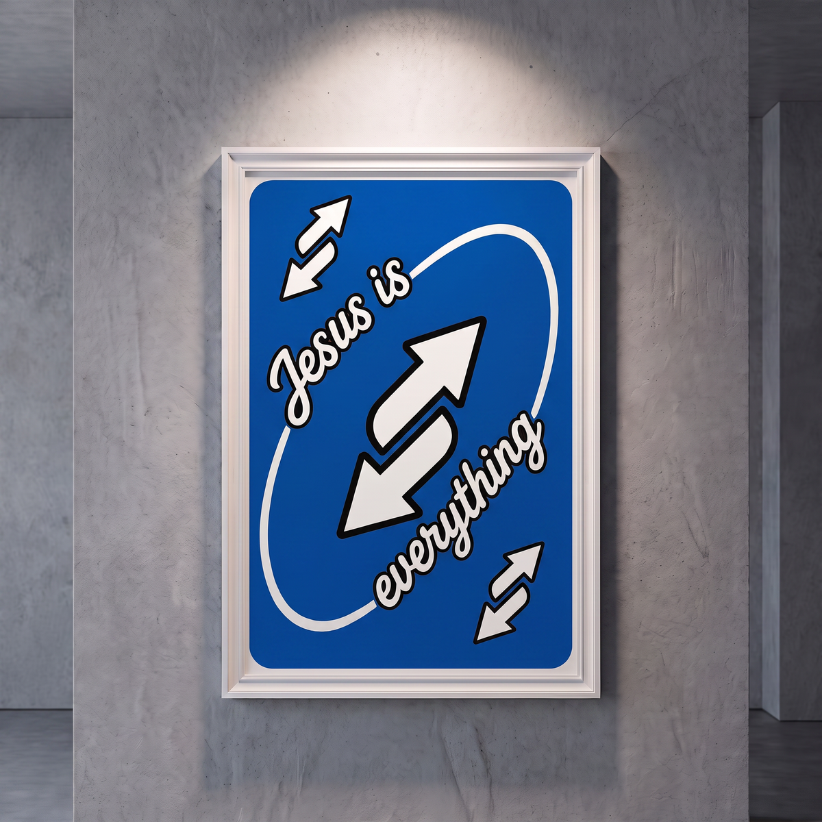 Jesus Is Everything blue poster with white script and arrow graphics, shown in a white frame on a gray wall.