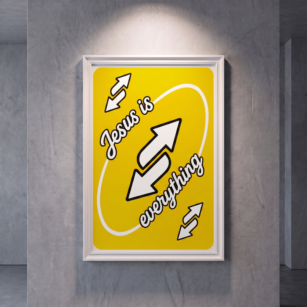 Jesus Is Everything yellow poster with white script and arrow graphics, shown in a white frame on a gray wall.