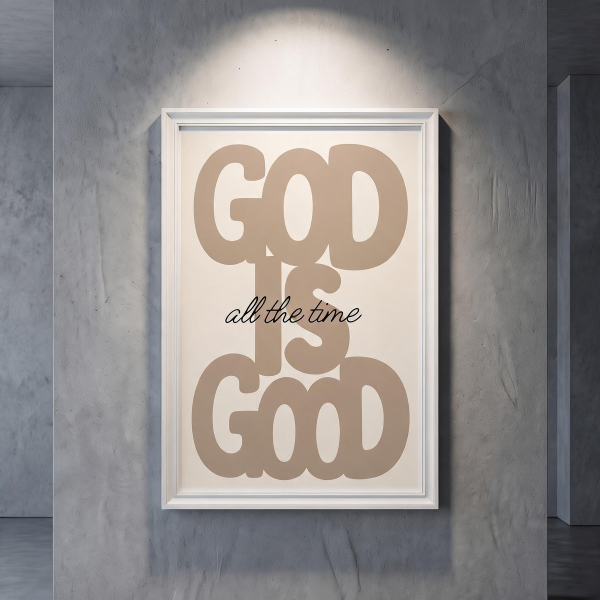 God Is Good brown typography poster on cream, displayed in a white frame against a gray wall.