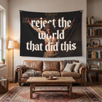 Reject the World Christian wall tapestry displayed above a sofa in a styled living-room mockup.